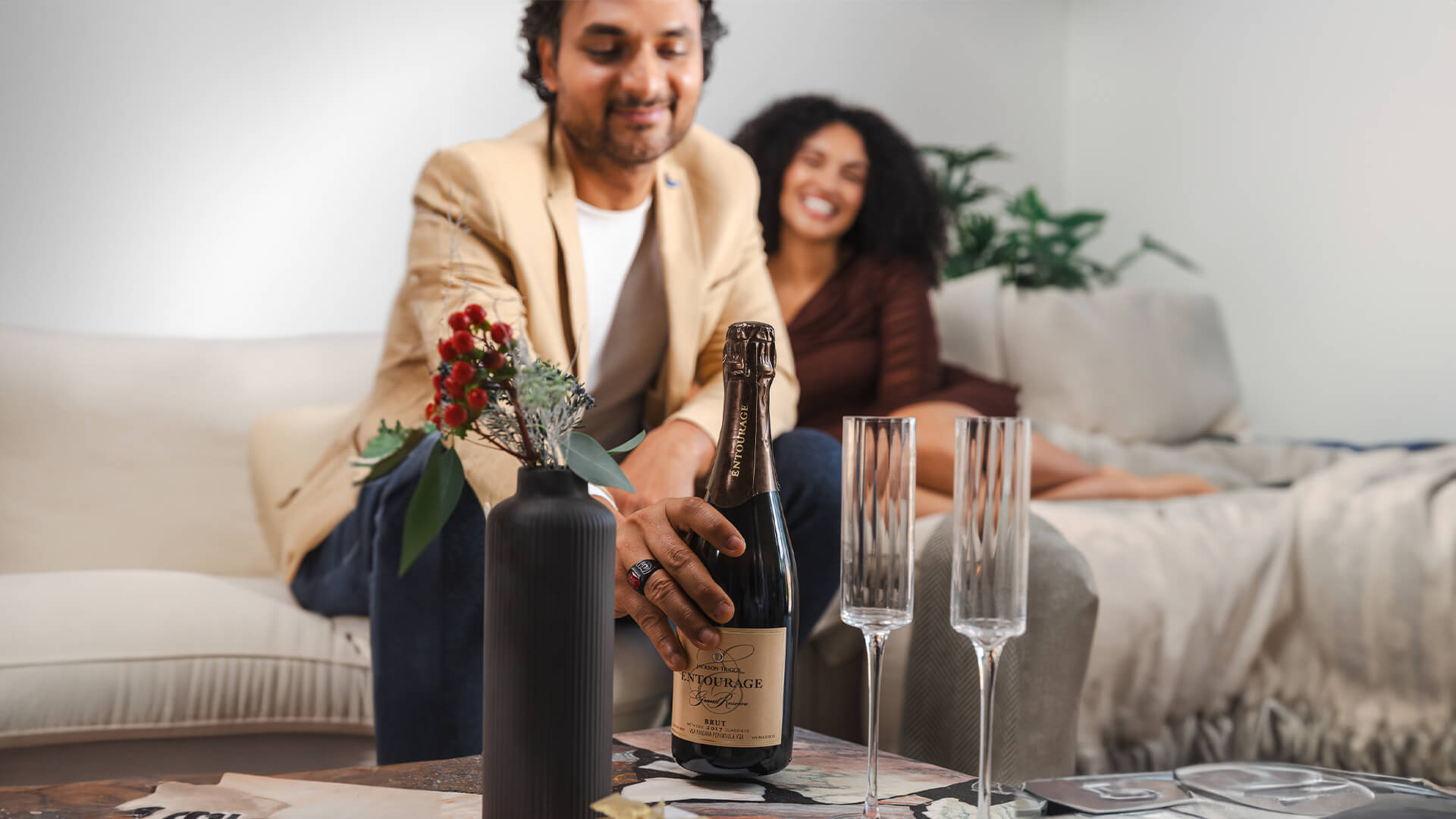 Couple enjoying some Jackson-Triggs Entourage Grand Reserve Brut