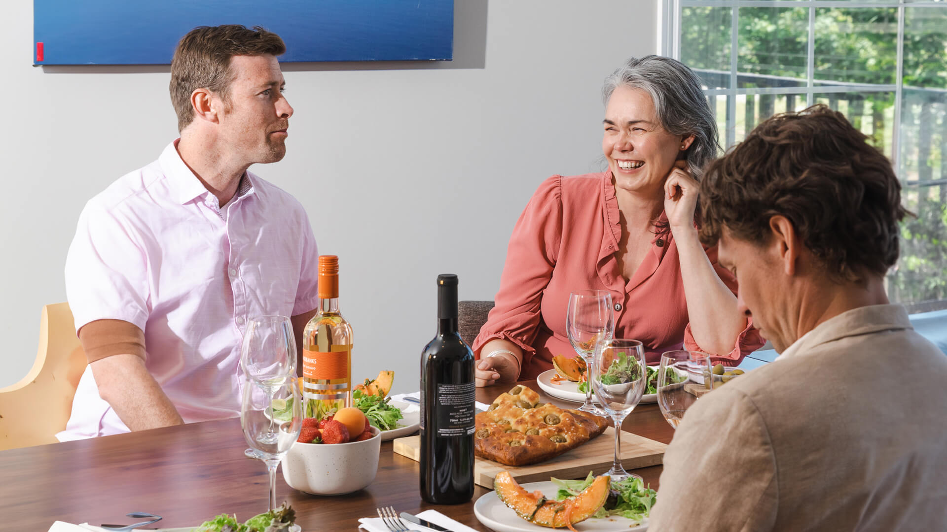 A group of friends enjoying brunch with Sandbanks.